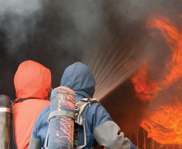 (7) Swedish firefighters performing gas cooling.