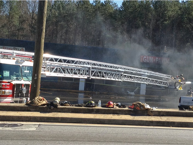 (9) The deck gun hitting the base of the fire = GOOD. Master streams up and in to cool the surfaces work well.