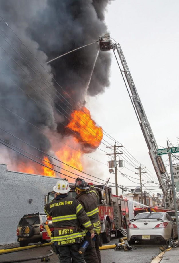 (6) Always position at least 10 feet away from energized power lines. In this photo, it was confirmed with the power company that the lines were deenergized. (Photo by Ron Jeffers.)