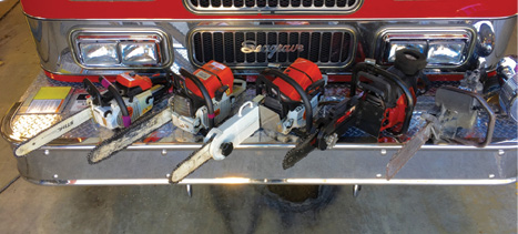 (2) Shown are five chain saw options for fire service use: (from left to right) small arbor chain saw with chipping blade, heavy duty chain saw with carbide-tipped blade, chain saw with blade depth guard and carbide-chipping blade, chain saw with blade depth guard and bullet blade, and specialized concrete-cutting chain saw with diamond blade.