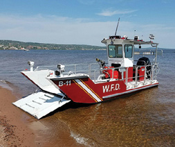 The Waconia (MN) Fire Department uses this LAKE ASSAULT fireboat to respond to water-related emergencies in Lake Waconia. Assistant Chief Brandon Kolesar says the boat can handle waves and rough water and can easily navigate shallow water. With lake activity expected to increase, the danger of boat collisions is a real concern. The design makes for an ultimate platform to secure patients.
