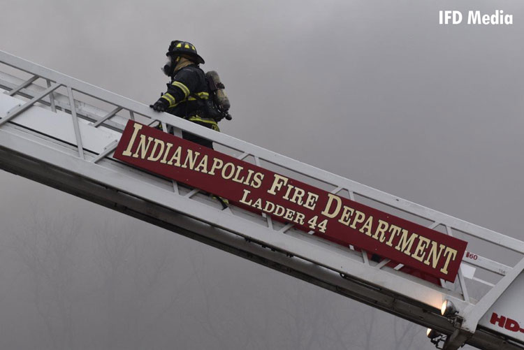 Indianapolis firefighter on an aerial ladder