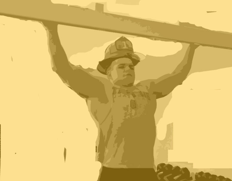 Man in fire helmet doing pull ups