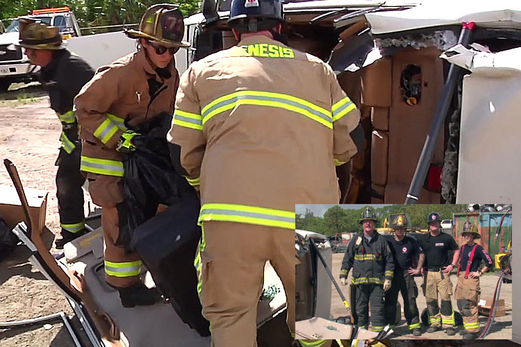 Firefighters remove debris from a hoarder vehicle