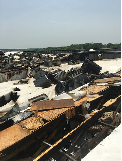 (7) An exterior view of the trench cut. Note the air-conditioning units. (Photo by Jerry Fokas.) 