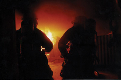 (3) These photos show the lowering of the neutral plane as the fire progresses toward flashover. (Photos courtesy of Tim Watkins.)