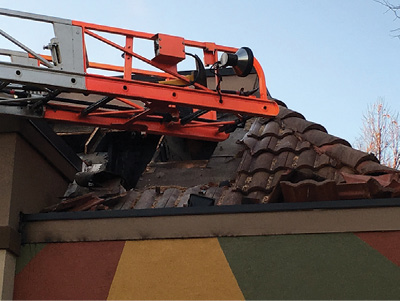 (6) View of the roof layers including the terra cotta tile on the roof. 