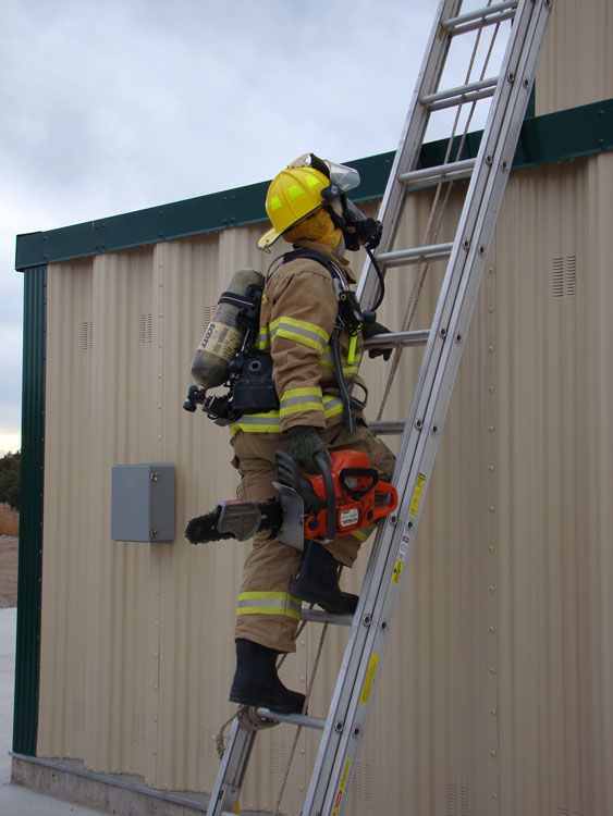 Firefighter performing ventilation