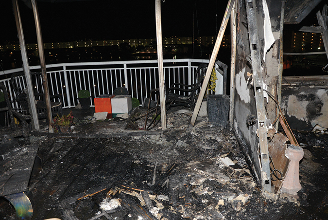 (1) Firefighters took a beating and risked being burned when fighting a fire in this large waterfront condominium unit with a 1¾- inch hoseline. (Photo by Ricardo Stephens.) (2) A “pigtail,” a short section of three-inch hose, 