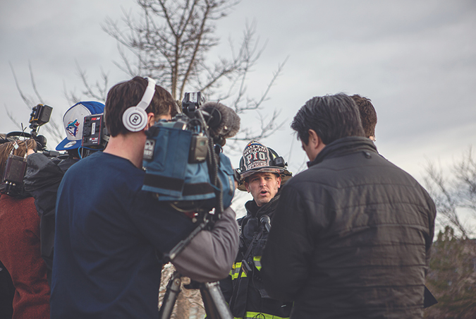 (1) Critical incidents quickly create stressful task saturation for public information officers. Although media interviews are a priority, focus on the timely capture of operations and updating of social media. (Photo by Rachel Hurst; all other photos by author.)