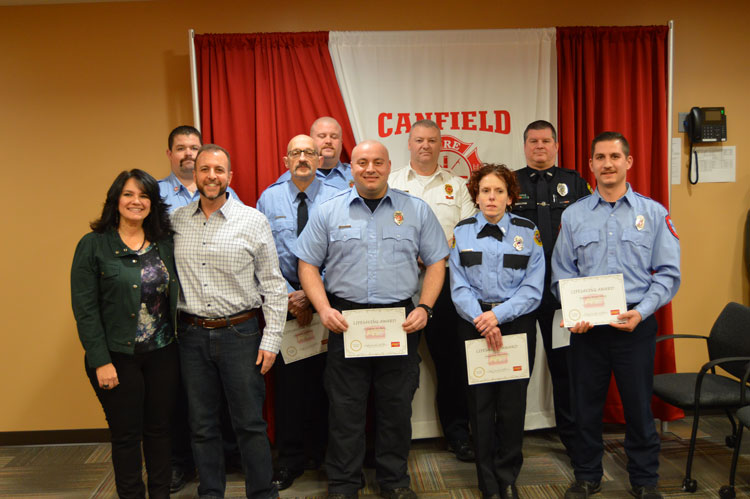 Man who sustained cardiac arrest with the responders who saved him