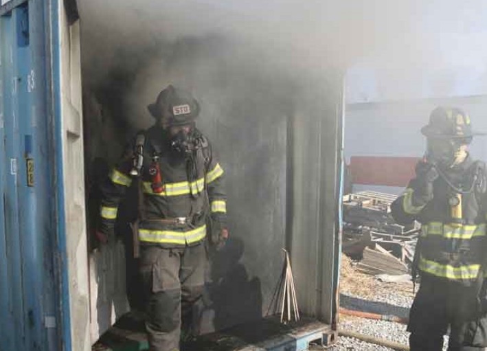 Firefighter in flashover container