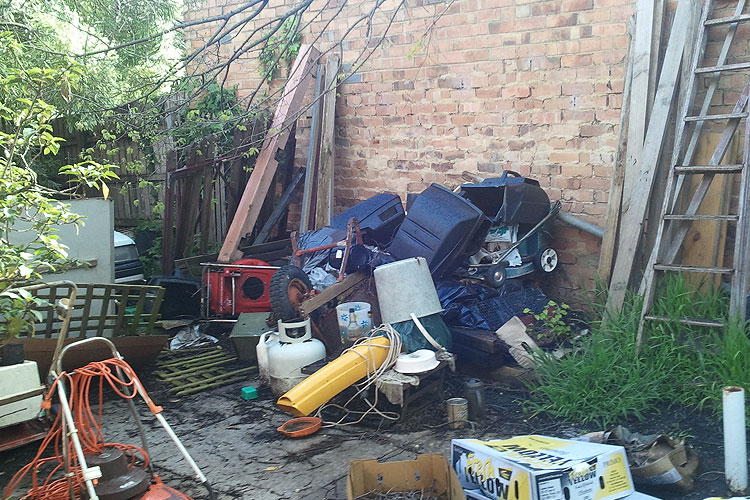 Hoarding outside a home