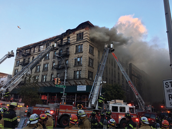  (14) Leave room in the front of the building for the tower ladder.