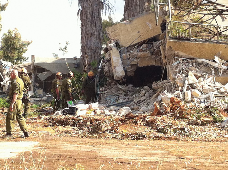 The Israeli Defense Force Homefront Command’s National Rescue Unit (NRU) members conduct a search and extraction of void areas in a collapsed building.