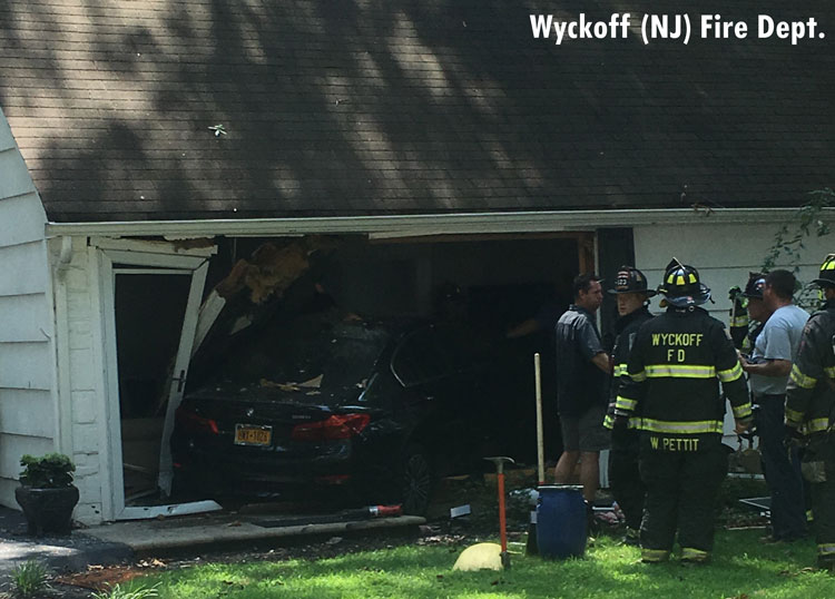 Car plowed into house