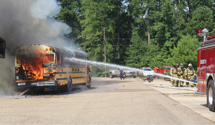 (1) In many cases, a transitional fire attack using a master stream, a 2½-inch handline, or a single-inlet monitor as the initial stream will be the most effective type of fire attack, especially when staffing is limited. (Photos by Dawn Young.)

