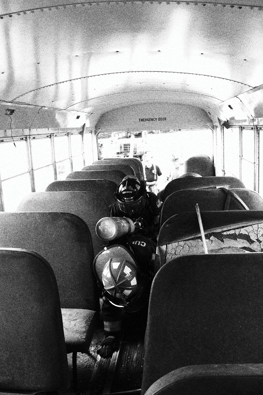 These firefighters are participating in a Brothers of the Boot F.O.O.L.S. training event in which they practiced making rescues from a bus under realistic conditions and in full personal protective equipment and self-contained breathing apparatus.