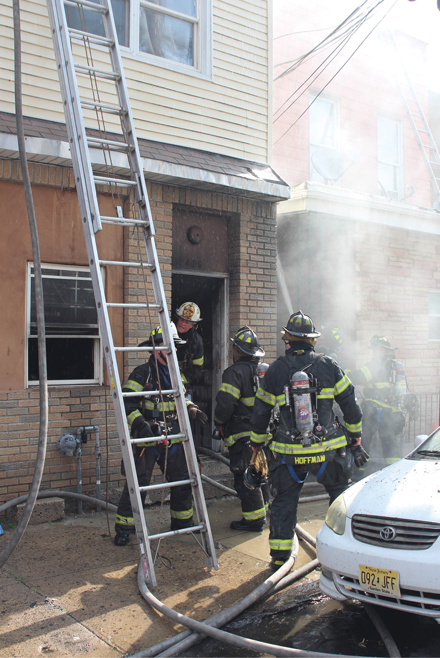 Two handlines were stretched to the interior stairs, which were fully involved on fire department arrival. A third handline was stretched to extinguish the fire and the outside of the building and protect the D exposure.