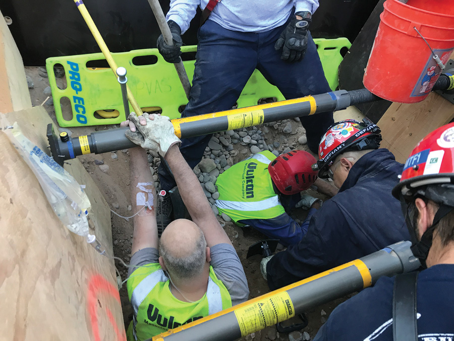 Crews work to free patients 3 and 4 who had been buried up to their necks. (Photos by Jake Bailey, Rio Rancho Fire and Rescue.)