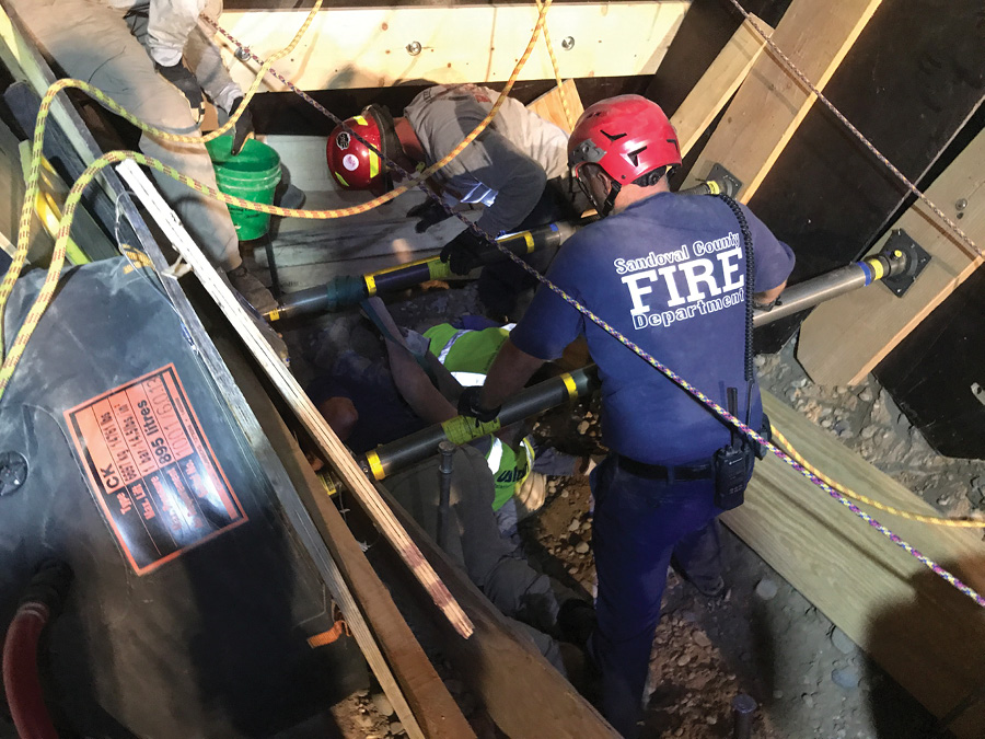 Crews work to free patients 3 and 4 who had been buried up to their necks. (Photos by Jake Bailey, Rio Rancho Fire and Rescue.)