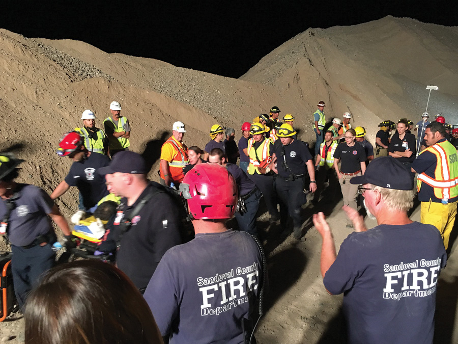 (4) The framework constructed for the final rescue. (5) The last trapped worker is freed. (Photos by James Maxon.)

