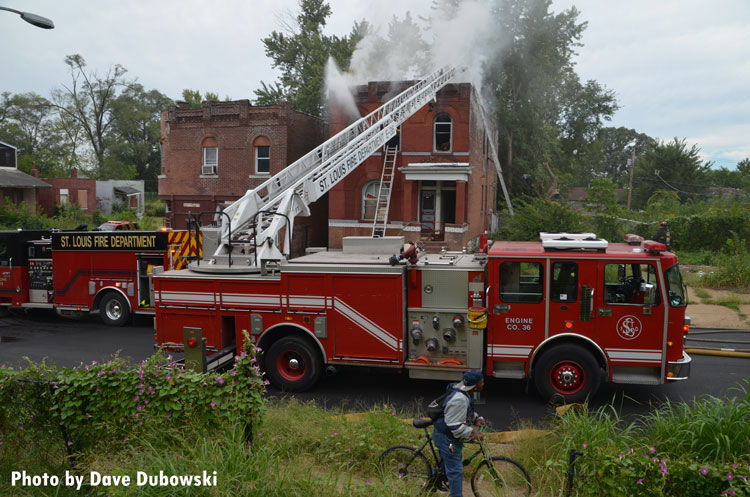 Fire apparatus in front of structure fire