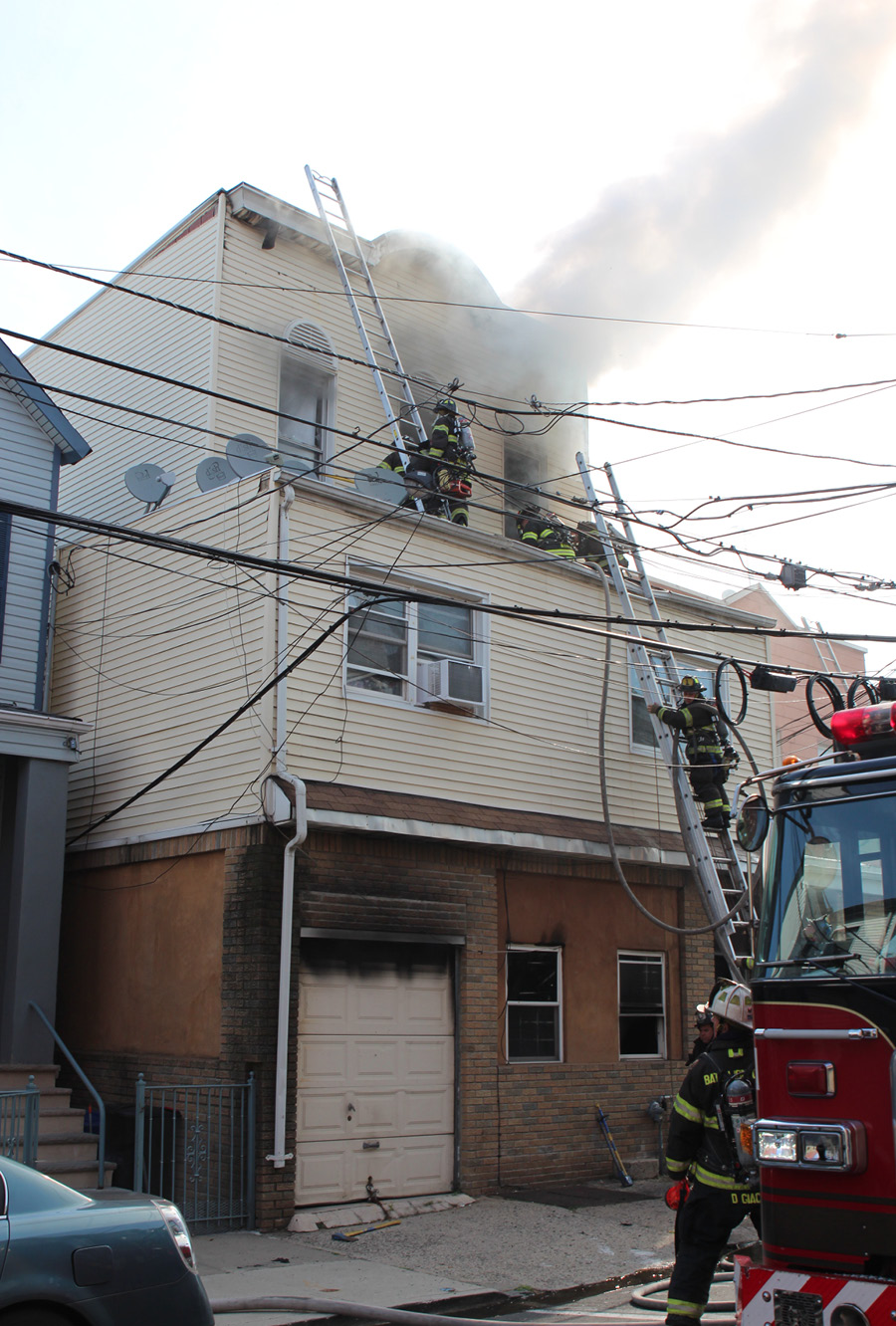 Truck companies laddered the building and engine companies stretched lines. You can see from the exterior that windows have been replaced and plywood is visible. This might indicate additional living spaces in this structure.