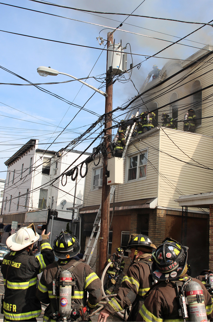 The fire vented out the exposure D stairwell window, igniting the siding and impacting the exposure D building. This fire was going to necessitate more resources.