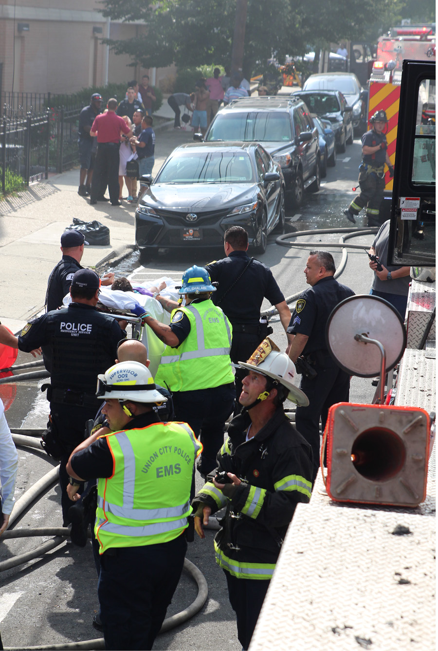 Firefighters turned the victims over to emergency medical services and police, as they were needed to continue searching throughout the fire building. Cooperation among all first responders is critical in instances with mass casualties.