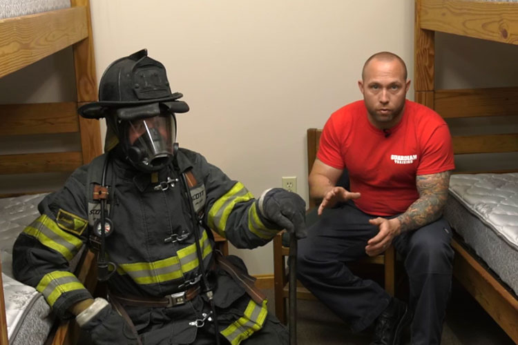 Michael Wood and a firefighter in full gear