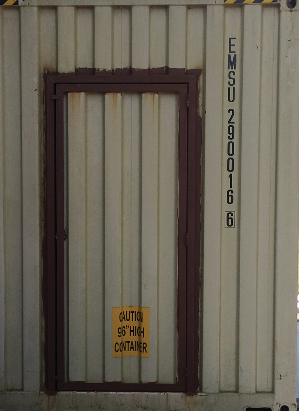 Salvaged actual entry doors can warp from heat and bind. Consider purpose-built doors. Note the door handle has not yet been installed.  (Photo by author.)