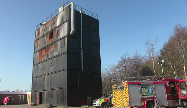 The high-rise live fire training prop of the West Midlands Fire Service in England. The containers have simulated offices, apartments, and more. (Photo courtesy of the West Midlands Fire Service.) 