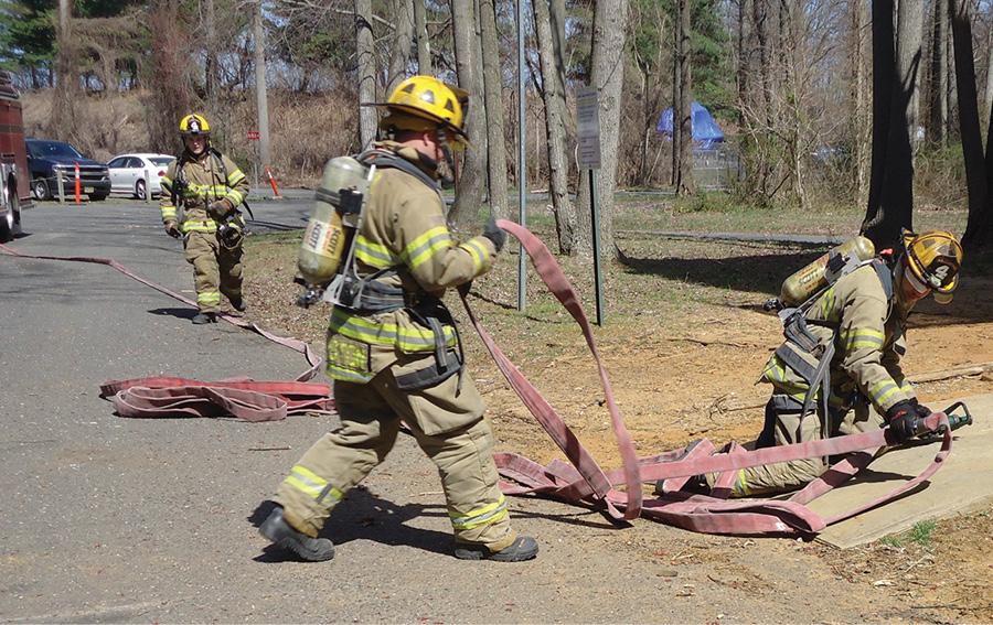 If the available space doesn’t allow for a perpendicular flake, the hose can be flaked parallel to the front of the fire building 