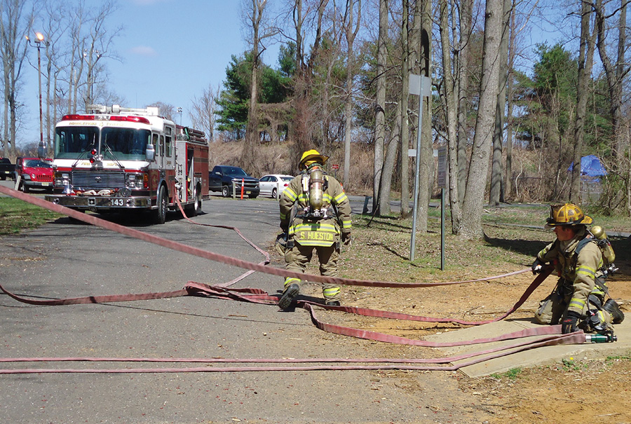 Remember that the nozzle firefighter’s position is stationary; he is just securing the nozzle and couplings so they do not accidentally get dragged out of position during the flake