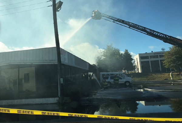 Four elevated master streams were used to control and eventually extinguish this very stubborn fire. 