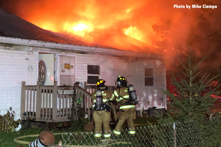 Firefighters at the scene of an Ohio house fire