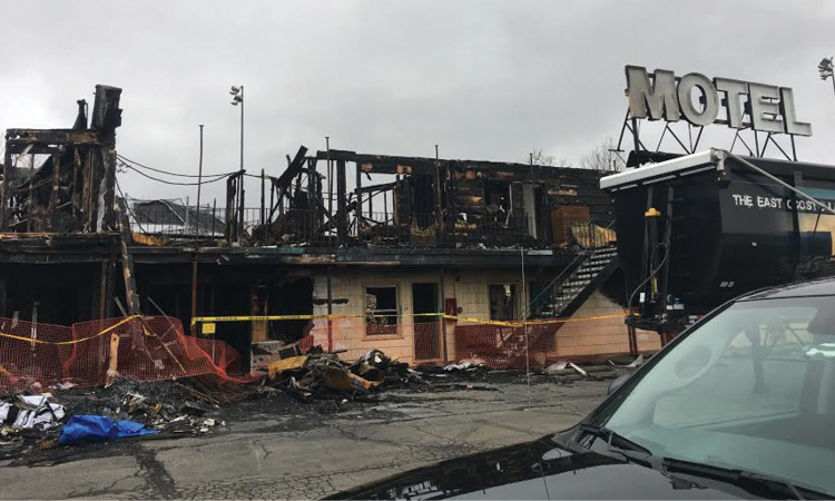 One person died in this overnight fire in a motel in Vestal, New York. The fire was caused by an electric space heater. (Photos by author.) 