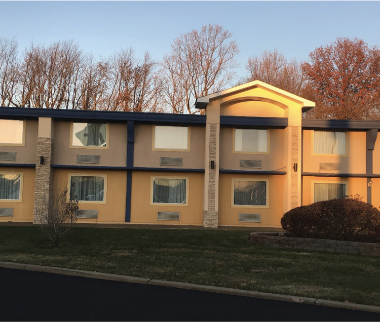 Send a company to the rear of these two-story motels to check for “jumpers” who may have escaped through sliding-glass windows.