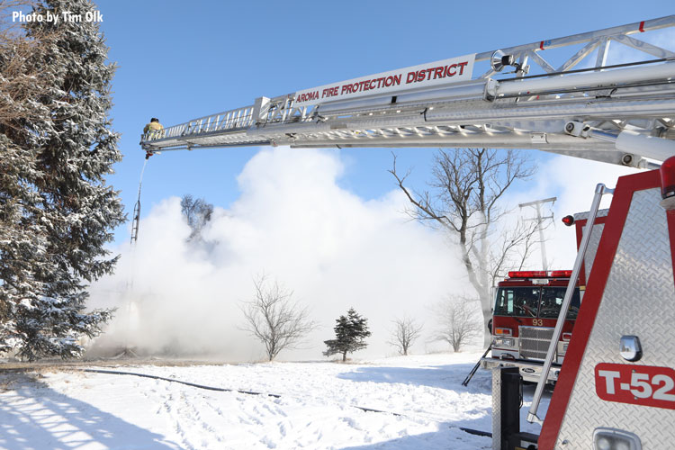 Aerial device at a house fire