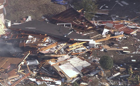 Gas explosion aftermath, collapsed home