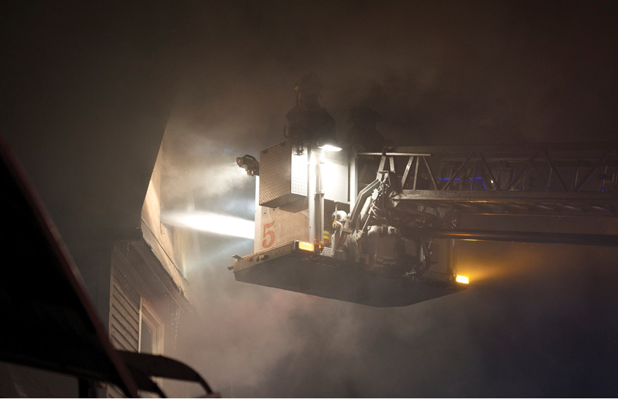 Operating the stream upward and near the window will assist in penetrating the cockloft and also tear open the roof from the underside. (Photo by J.J. Cassetta.) 