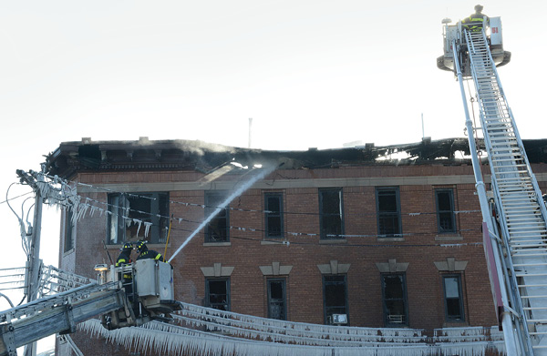 Always use caution while operating near the cornice; it can collapse in an instant when involved with heavy fire conditions or when severely damaged. (Photo by Danny Alfonso.)