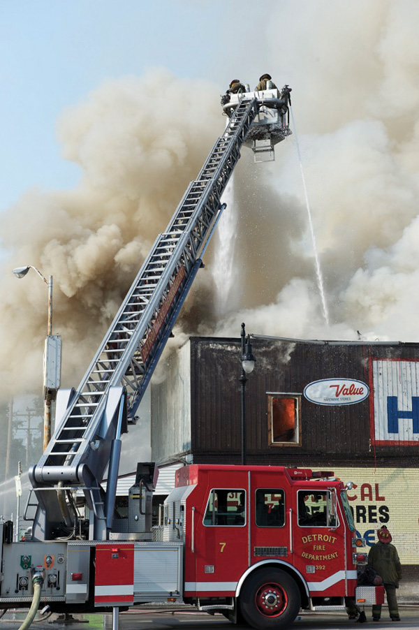 When the roof is sagging or ready to collapse, tower ladders should operate above it so that the walls don’t fall onto the bucket and for overall safety. (Photo by J.J. Cassetta.)