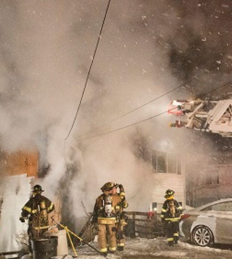 Black smoke can instantly turn bright white when contacting outside, frigid air. (Photo courtesy of Keith Muratori, Firegroundimages.com.)