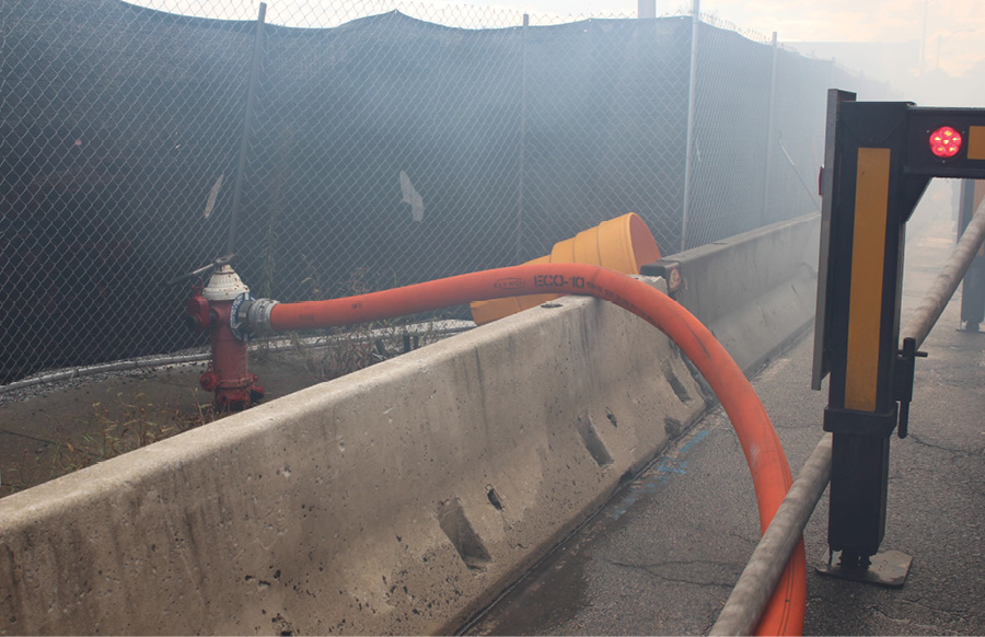 Although the water supply was good, hookups were more difficult. The hydrants across the street from the fire building were behind Jersey barriers because of ongoing construction/redevelopment. (Photo by Ron Jeffers.)