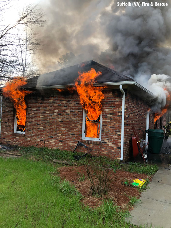 View of breezway between garage and residence