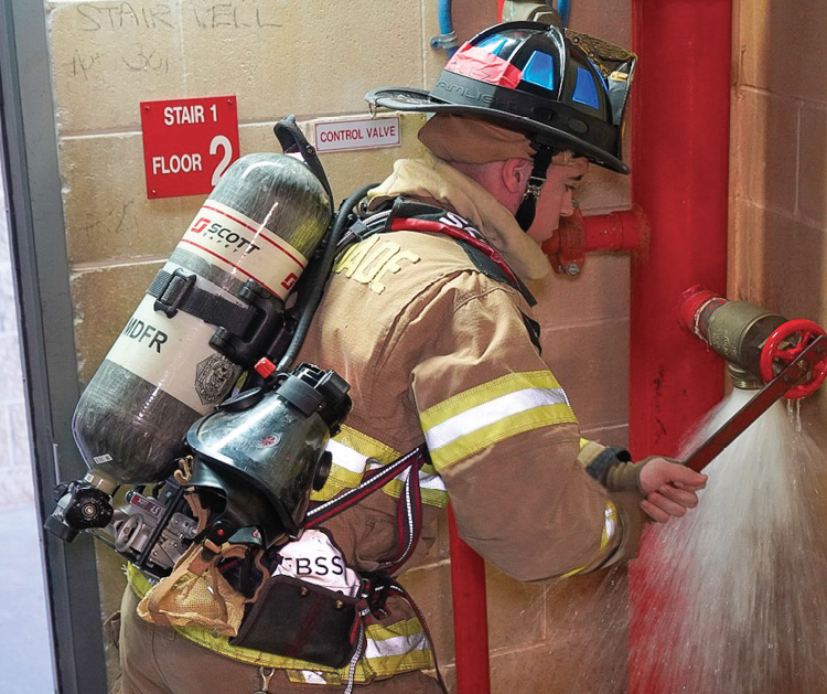 Thoroughly flush a standpipe outlet to clear it of rocks, sediment, and debris. Don’t let occupants get caught in the waterfall and be swept down the stairs. (Photos by Ricardo Stephens unless otherwise noted.)