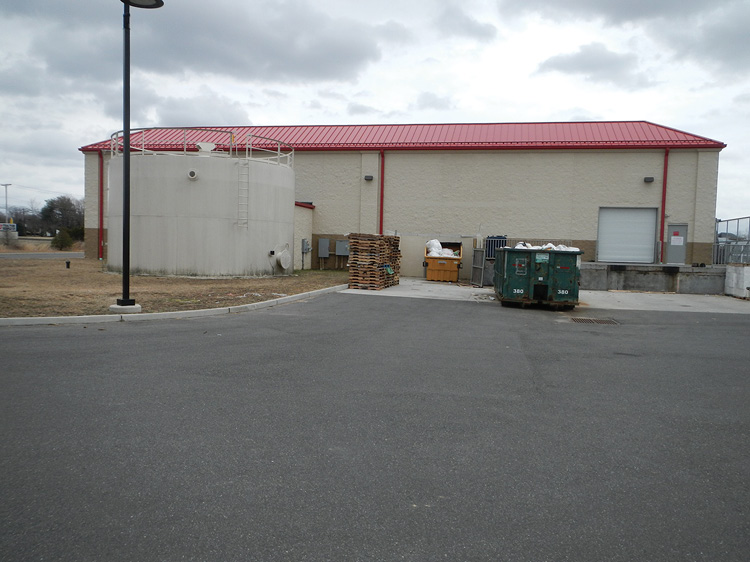 (5) The water tank at the rear of the building.