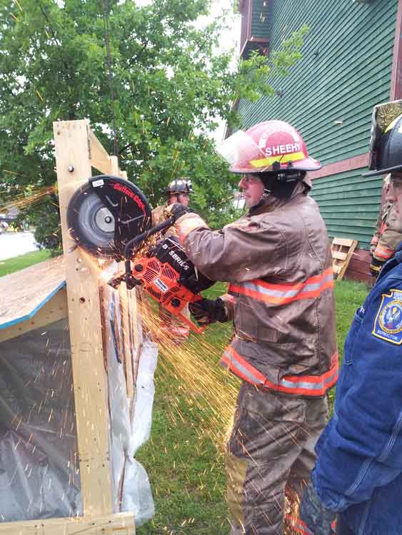 Sparks from rotary saw